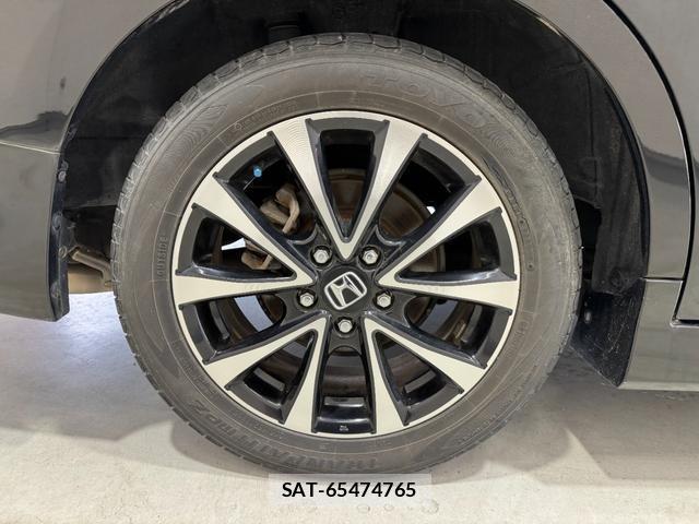Honda e 2014-09 8006127-7