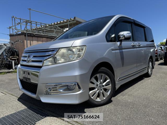 Honda e 2011-06 8009424-1