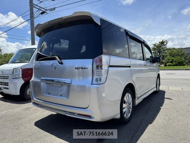 Honda e 2011-06 8009424-5