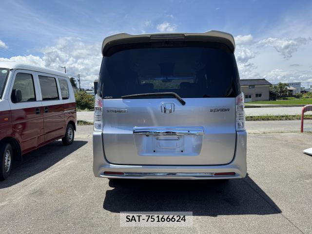 Honda e 2011-06 8009424-6