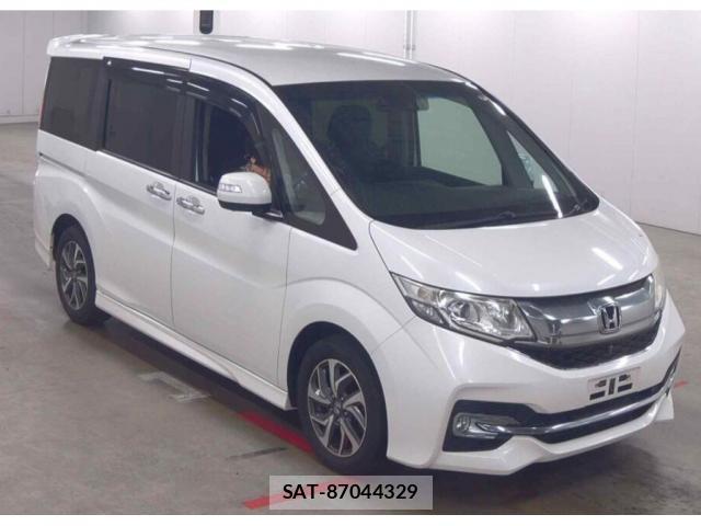 Honda e 2015-06 8010564-0