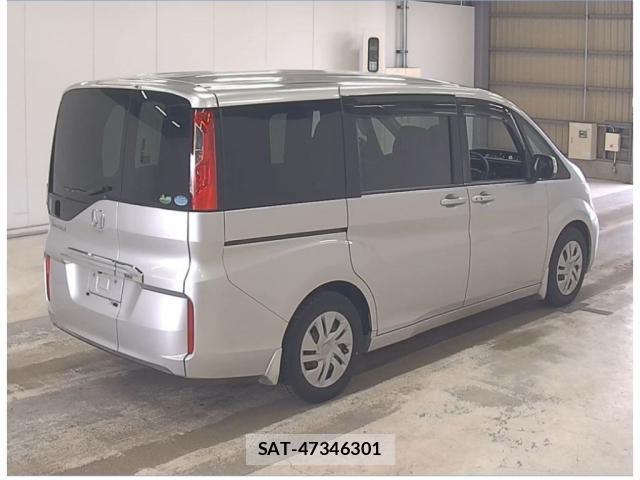 Honda e 2015-10 8003322-1