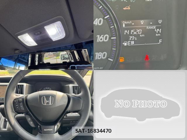 Honda e 2010-06 8222458-17