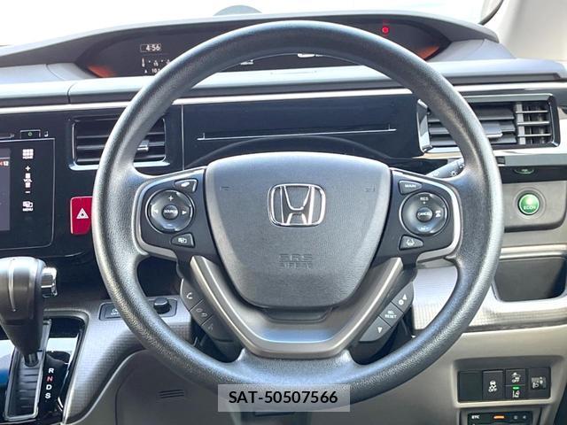 Honda e 2015-08 8219188-6