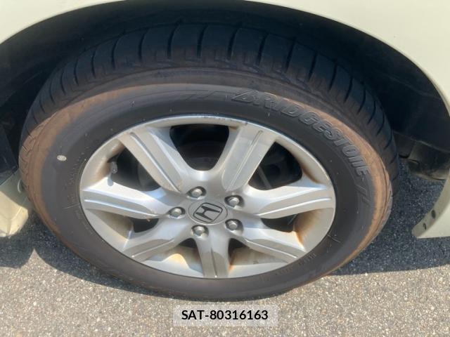Honda e 2010-02 8219641-11