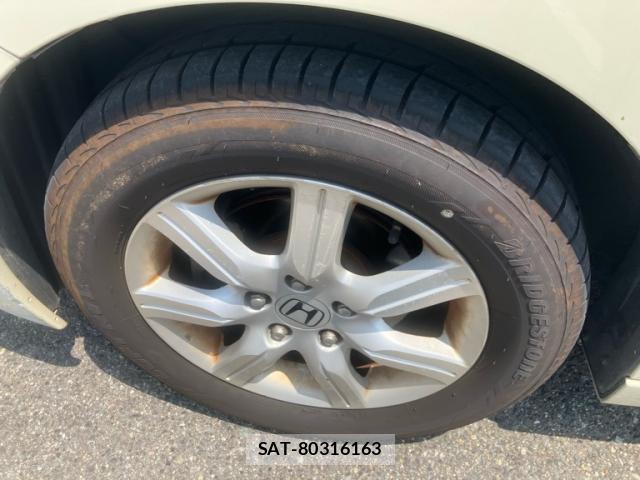 Honda e 2010-02 8219641-14