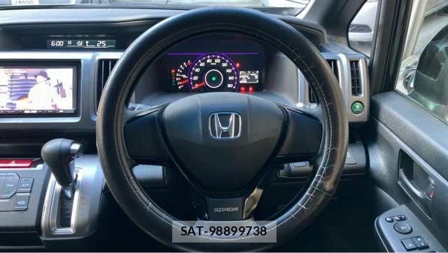Honda e 2010-06 8280619-16
