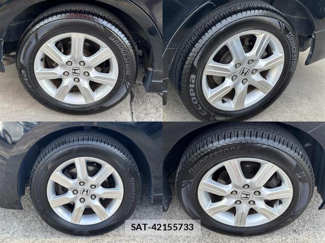 Honda e 2011-08 8548555-8