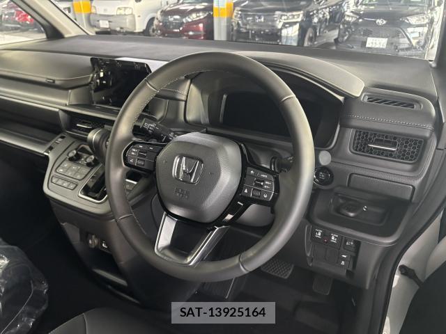 Honda e 2026-08 8653210-2