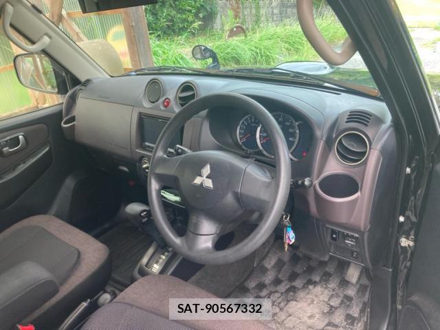 Mitsubishi PAJERO MINI 2012-10 8873419-11