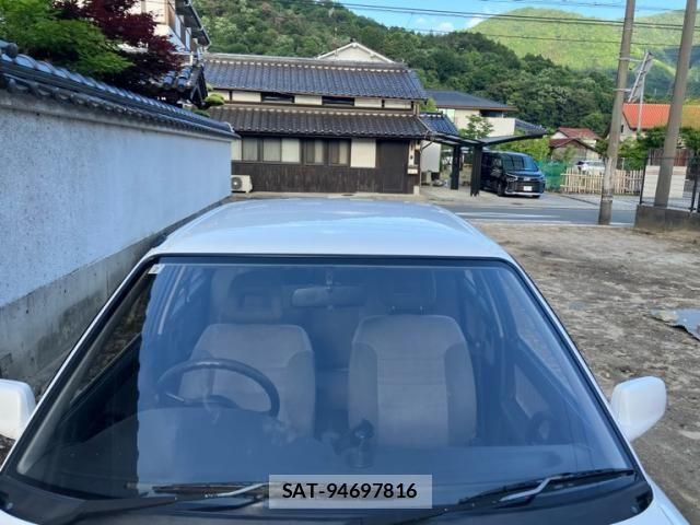 Mazda FAMILIA 1990-08 7058497-2