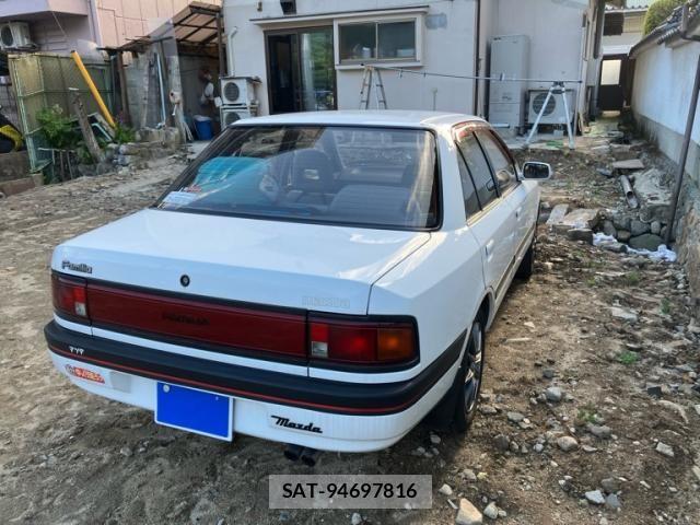 Mazda FAMILIA 1990-08 7058497-3