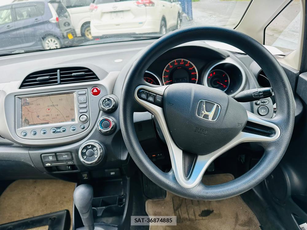 Honda FIT 2009-10 7444391-13
