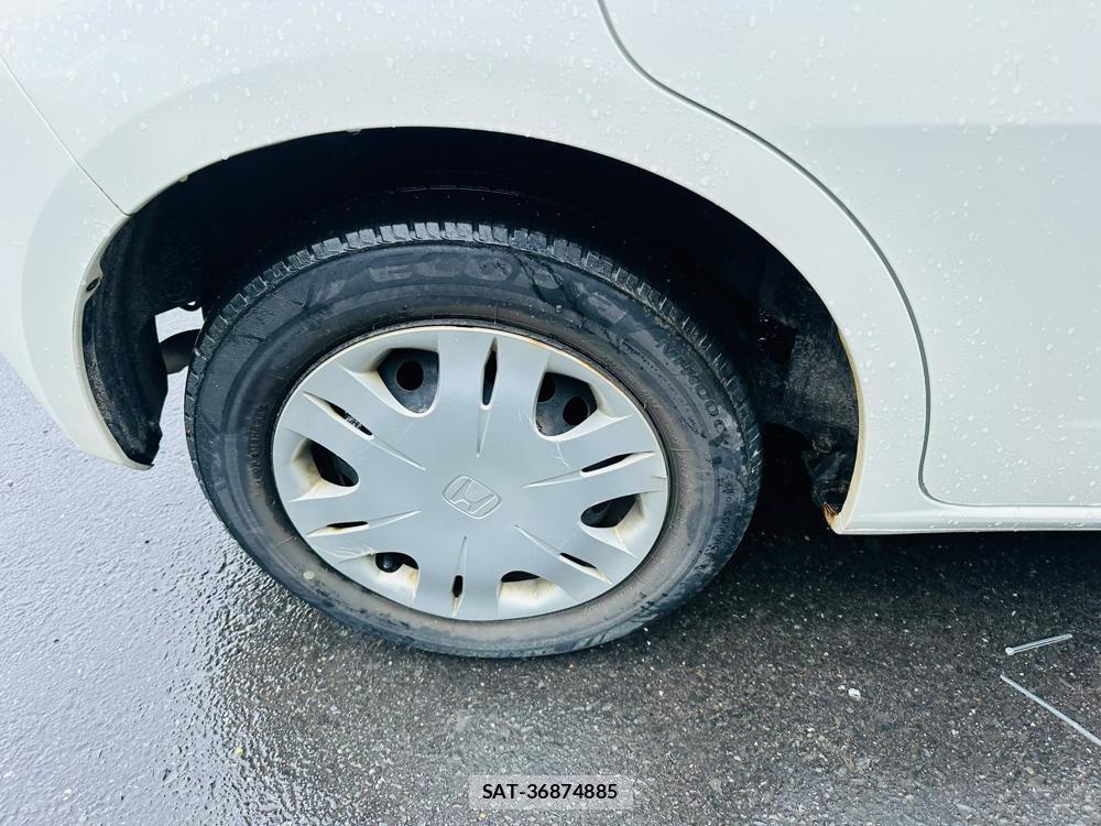 Honda FIT 2009-10 7444391-26