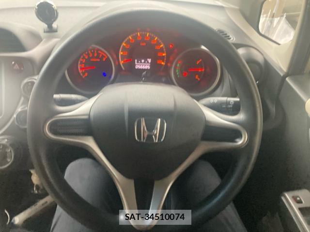 Honda FIT 2009-06 7616544-14