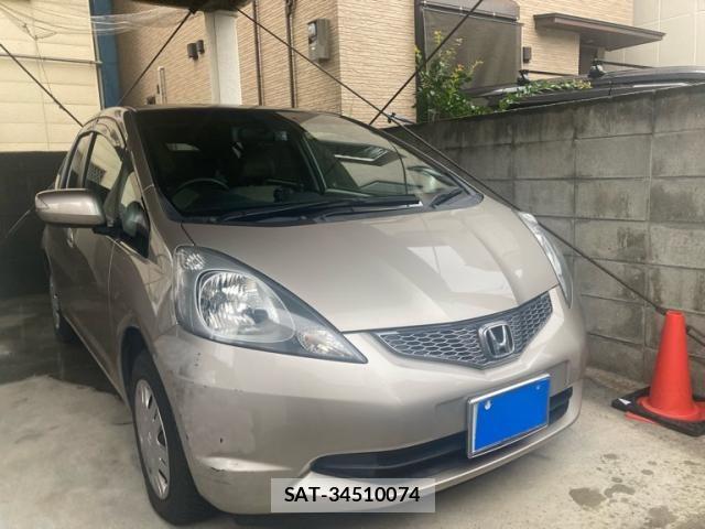 Honda FIT 2009-06 7616544-1