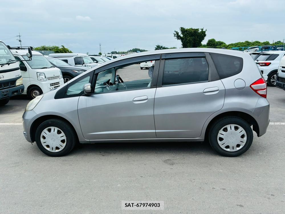 Honda FIT 2009-06 7736489-1