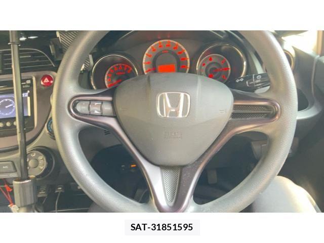 Honda FIT 2012-03 8335833-11