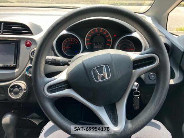 Honda FIT 2009-09 8335832-13