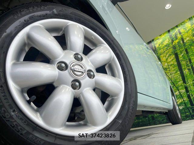 Nissan MOCO 2011-07 7618263-12