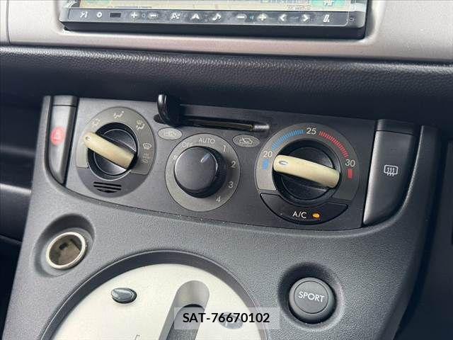 Subaru R2 2010-03 8831232-3