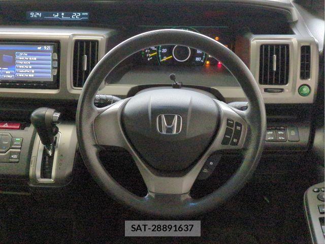 Honda e 2013-03 6615019-8