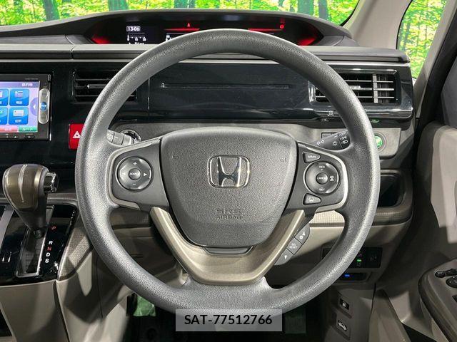 Honda e 2015-09 7359950-11