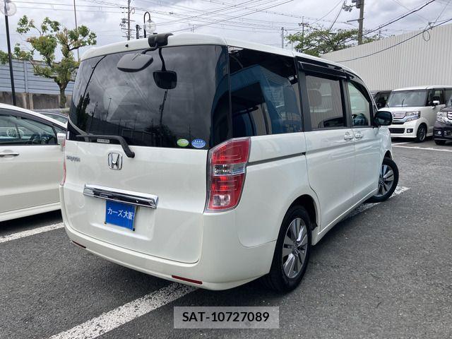 Honda e 2010-04 7394275-3