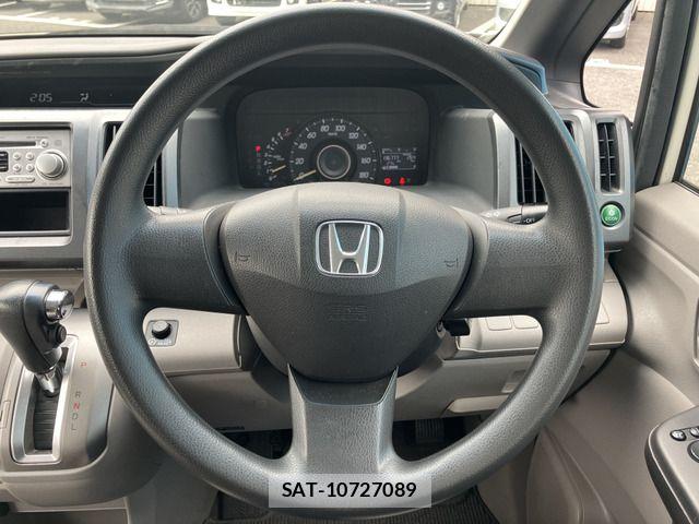 Honda e 2010-04 7394275-6