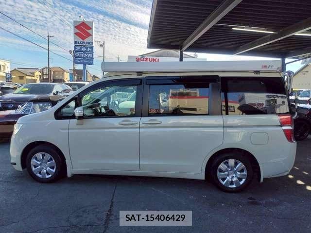 Honda e 2011-06 7620320-7