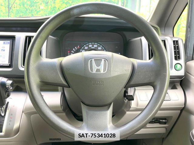 Honda e 2010-03 7729153-11