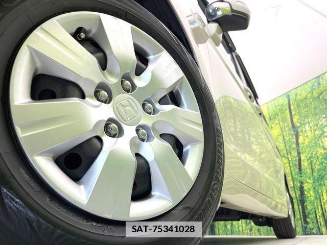 Honda e 2010-03 7729153-13