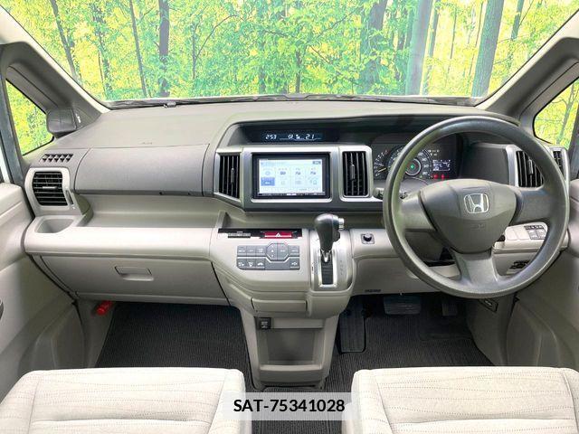 Honda e 2010-03 7729153-1