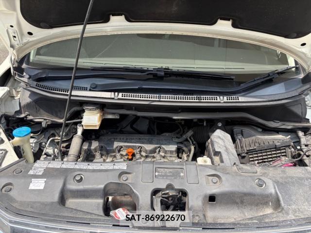 Honda e 2011-03 7789408-10