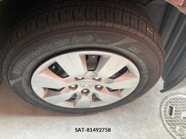 Honda e 2010-07 8337995-6