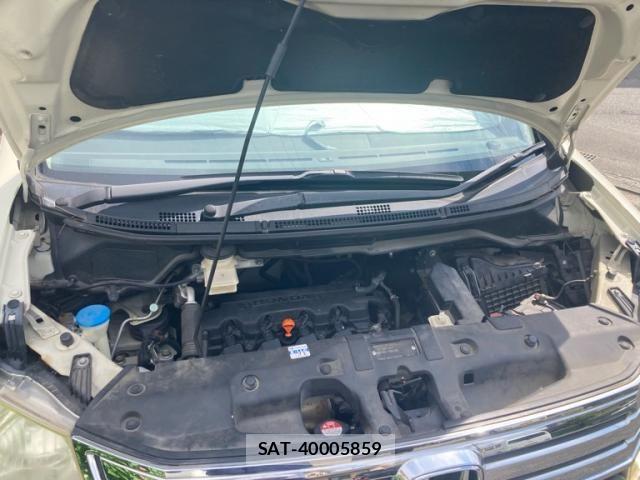 Honda e 2010-06 8563639-10