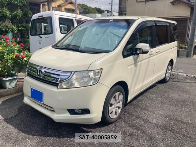 Honda e 2010-06 8563639-1