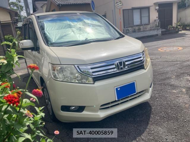 Honda e 2010-06 8563639-2