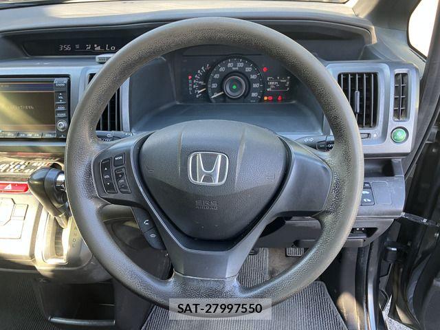 Honda e 2012-03 8629061-6