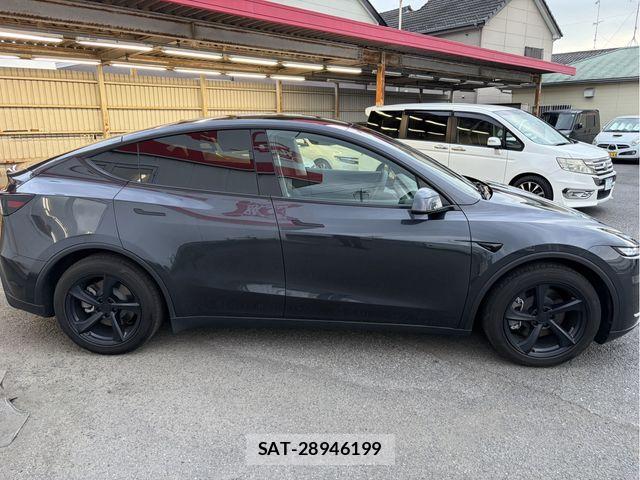 Tesla MODEL Y 2025-06 8232148-6