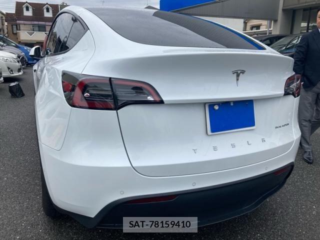 Tesla MODEL Y 2024-03 8317655-1