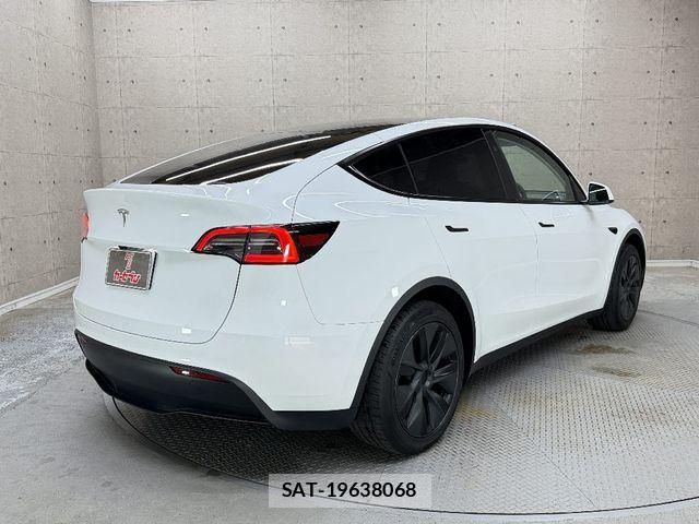 Tesla MODEL Y 2024-06 8667035-1