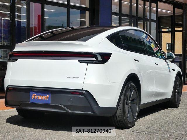 Tesla MODEL Y 2025-12 8882621-1