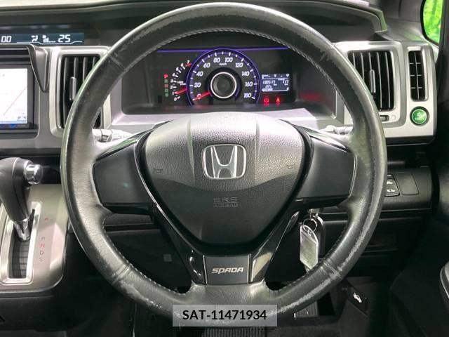 Honda e 2010-06 248399-12