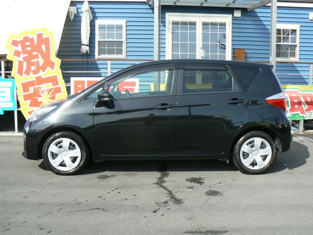 Toyota RACTIS 2011-01 1308-1