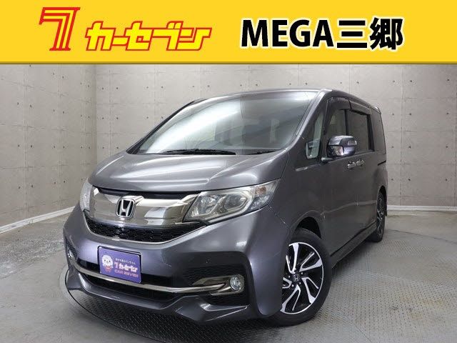Honda e 2015-07 7870-0