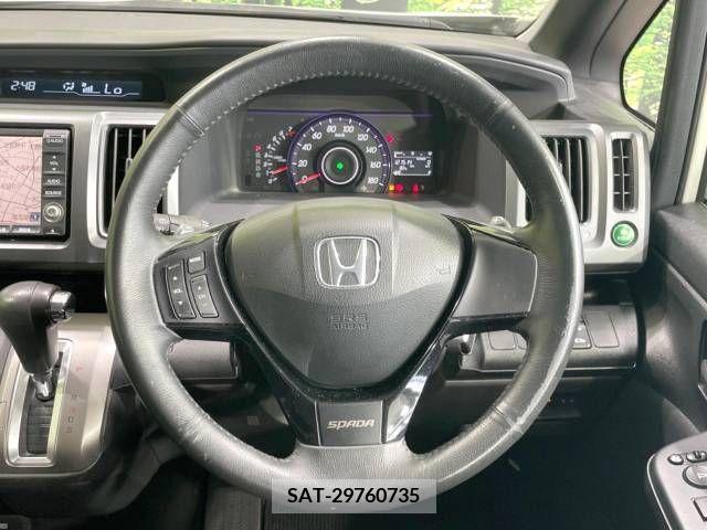 Honda e 2010-06 348125-12