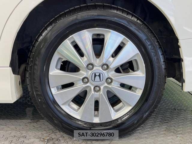 Honda e 2010-04 394306-14