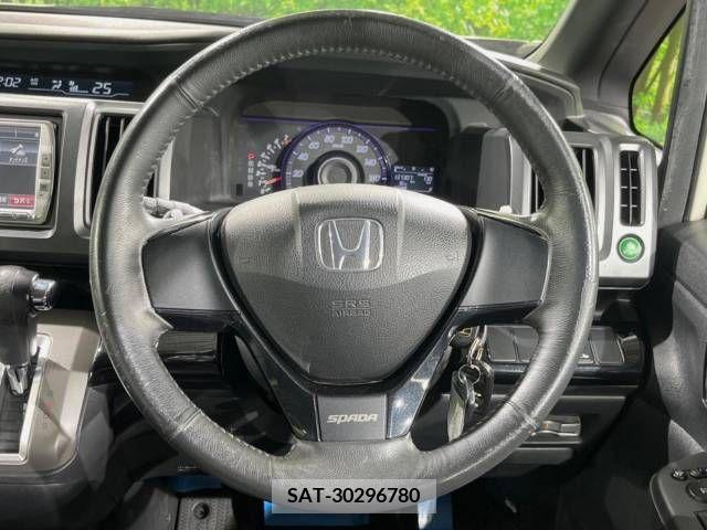 Honda e 2010-04 394306-12