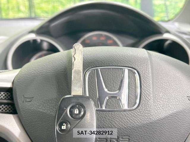 Honda FIT 2010-09 396552-5